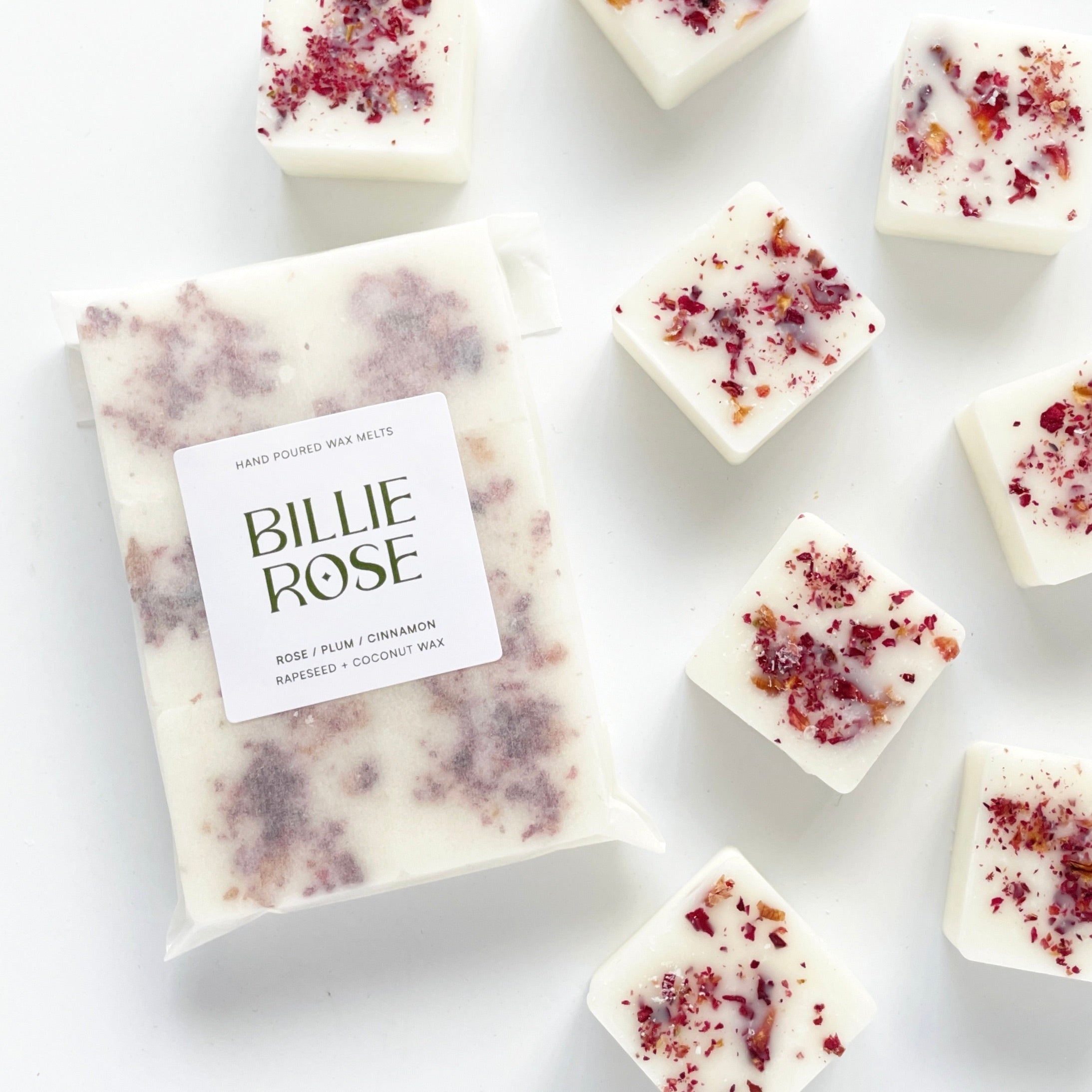 packet of wax melts and loose wax melts decorated with dried botanicals